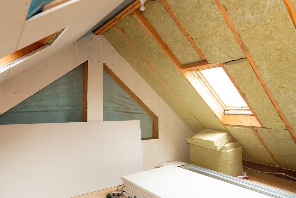 How to Remove Blown Insulation from Attic