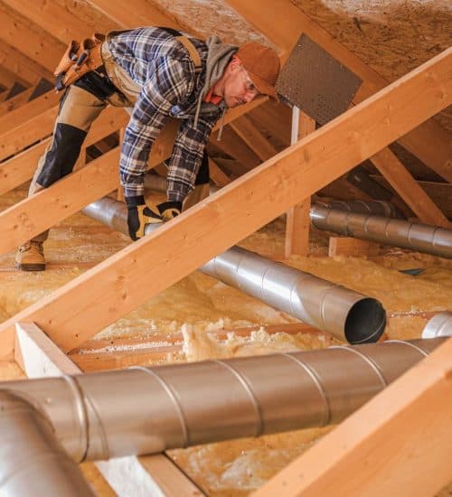 HVAC specialist installing an AC unit