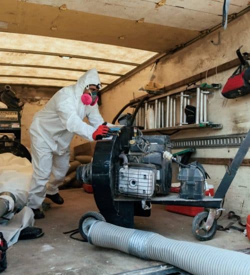 Attic Pros professional pushing insulation machine