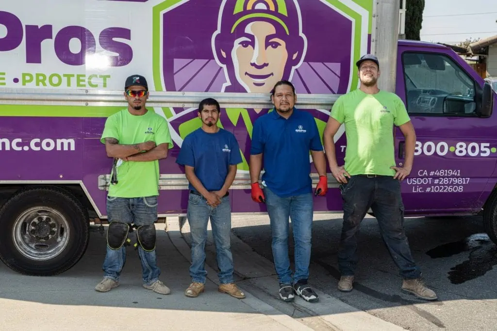 Attic Pros branded truck on a job