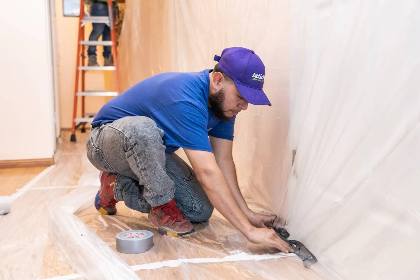 The Attic Pros attic cleaning team on site