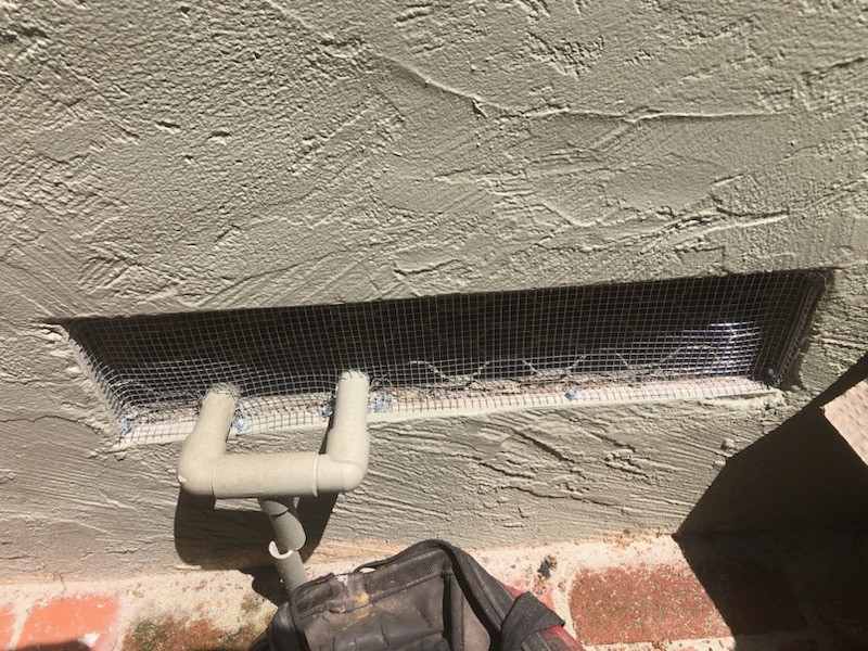 Attic after restoration: clean insulation and radiant barrier.